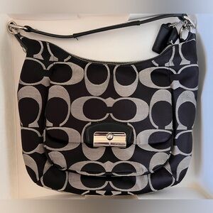 Coach ~ Gently used black fabric handbag with serial number